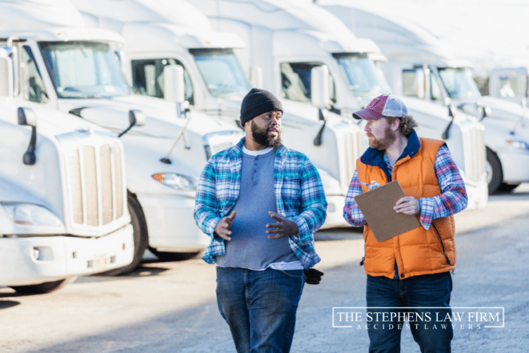 two Texas truck drivers discussing how to prevent commercial trucking accidents