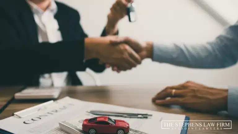 lawyer shaking hands with client