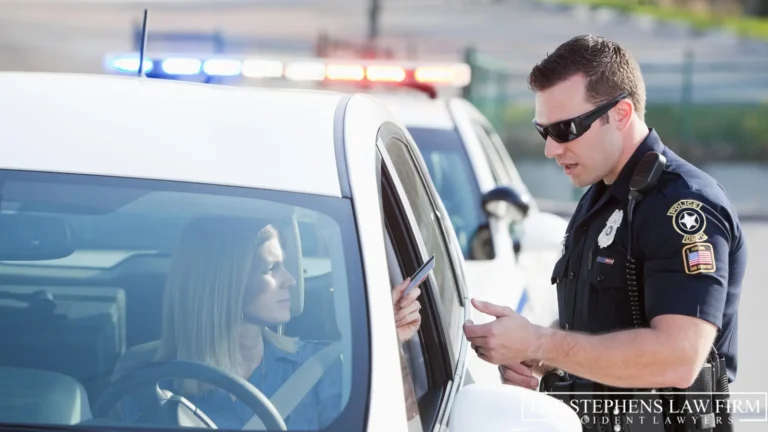 woman in car giving police report